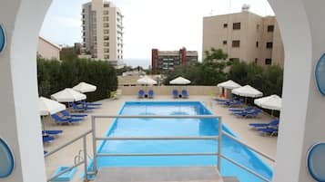 Outdoor pool, open 8:30 AM to 7:30 PM, pool umbrellas, sun loungers