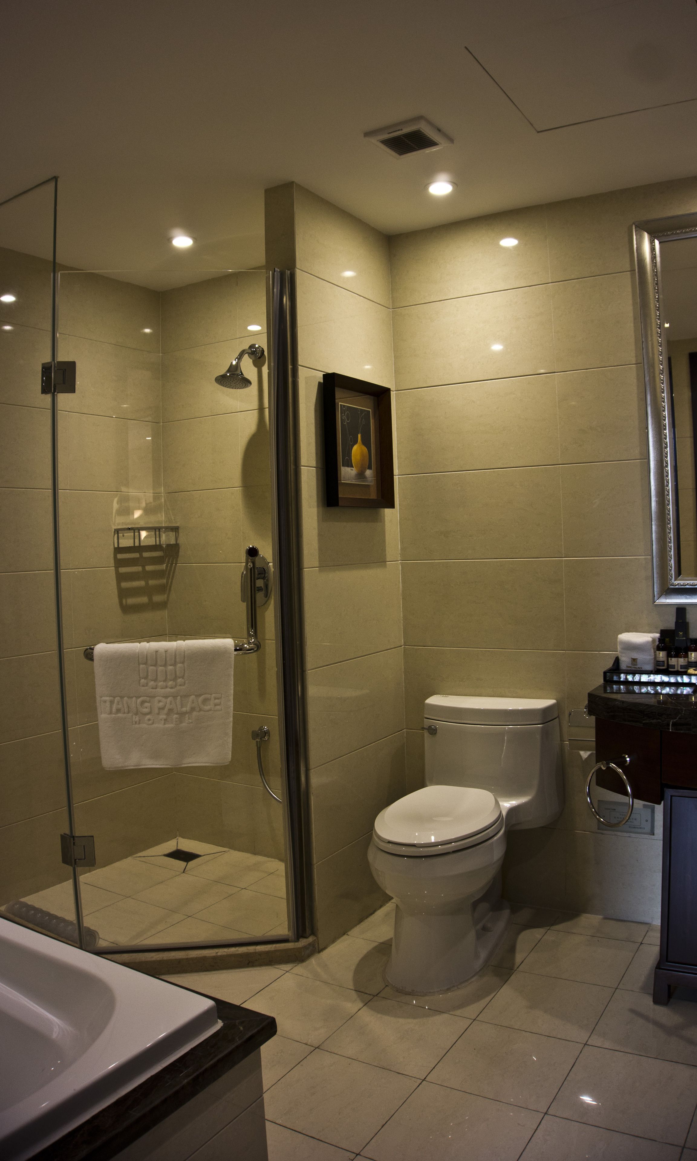 combined shower/bathtub, deep-soaking bathtub, designer toiletries