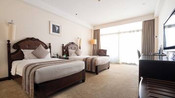 Habitación superior con 2 camas individuales | Ropa de cama de alta calidad y minibar