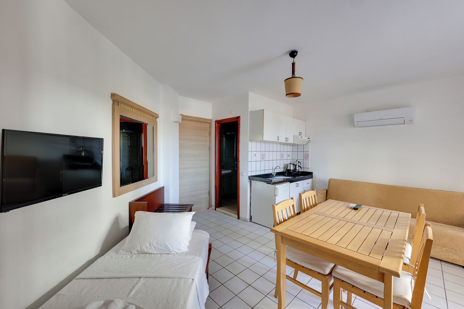 Apartment, 1 Bedroom | Living area | TV