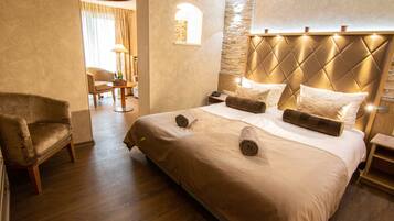 Superior Suite | Minibar, in-room safe, iron/ironing board, free WiFi