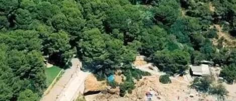 Una spiaggia nelle vicinanze, teli da spiaggia