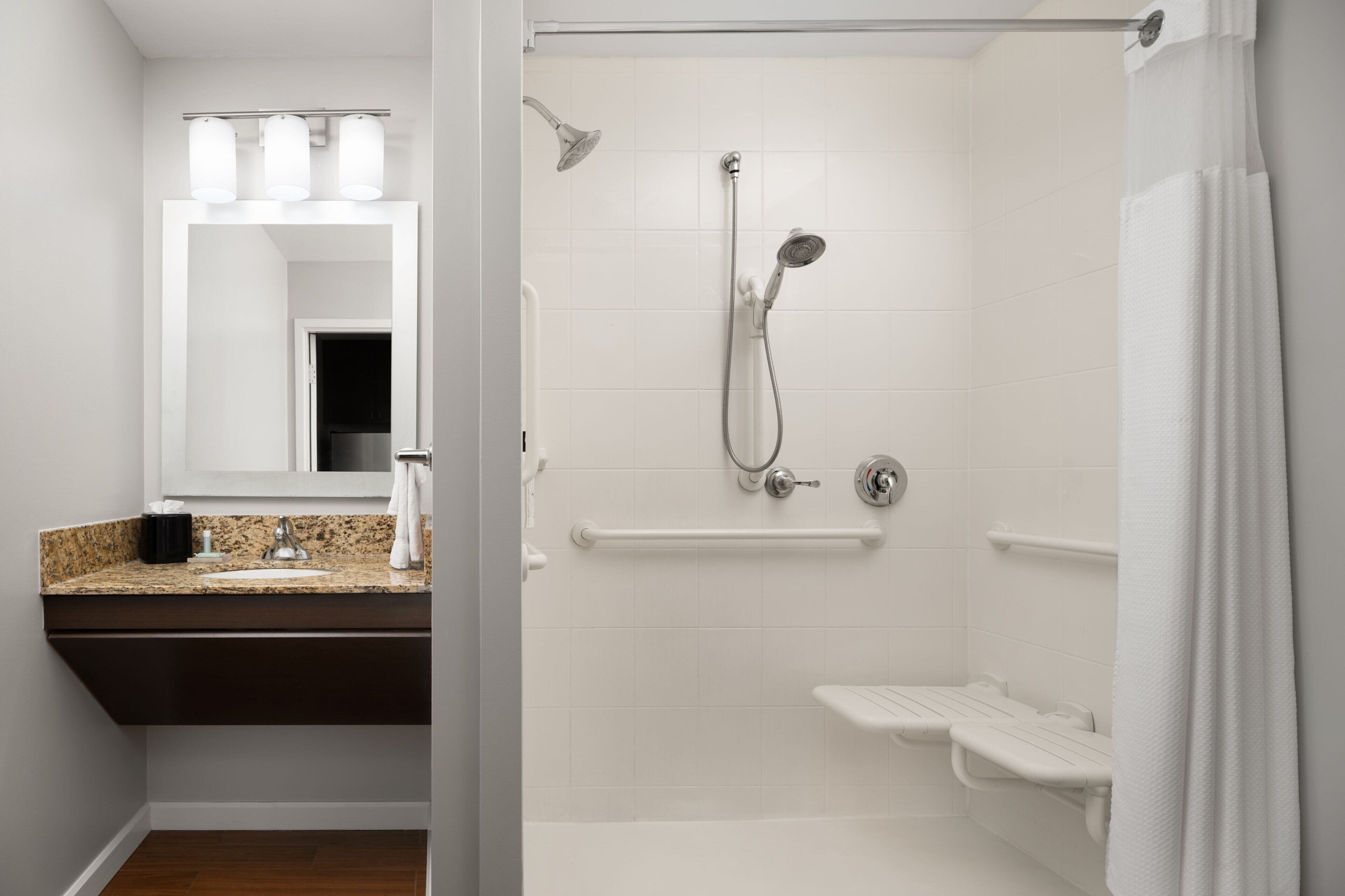 studio, 2 queen beds (mobility accessible, roll-in shower) | bathroom | shower, hair dryer, towels