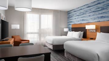 Desk, laptop workspace, iron/ironing board, free cribs/infant beds