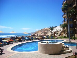 Outdoor pool - Beachfront Las Olas 2bdr Condo (San José del Cabo)