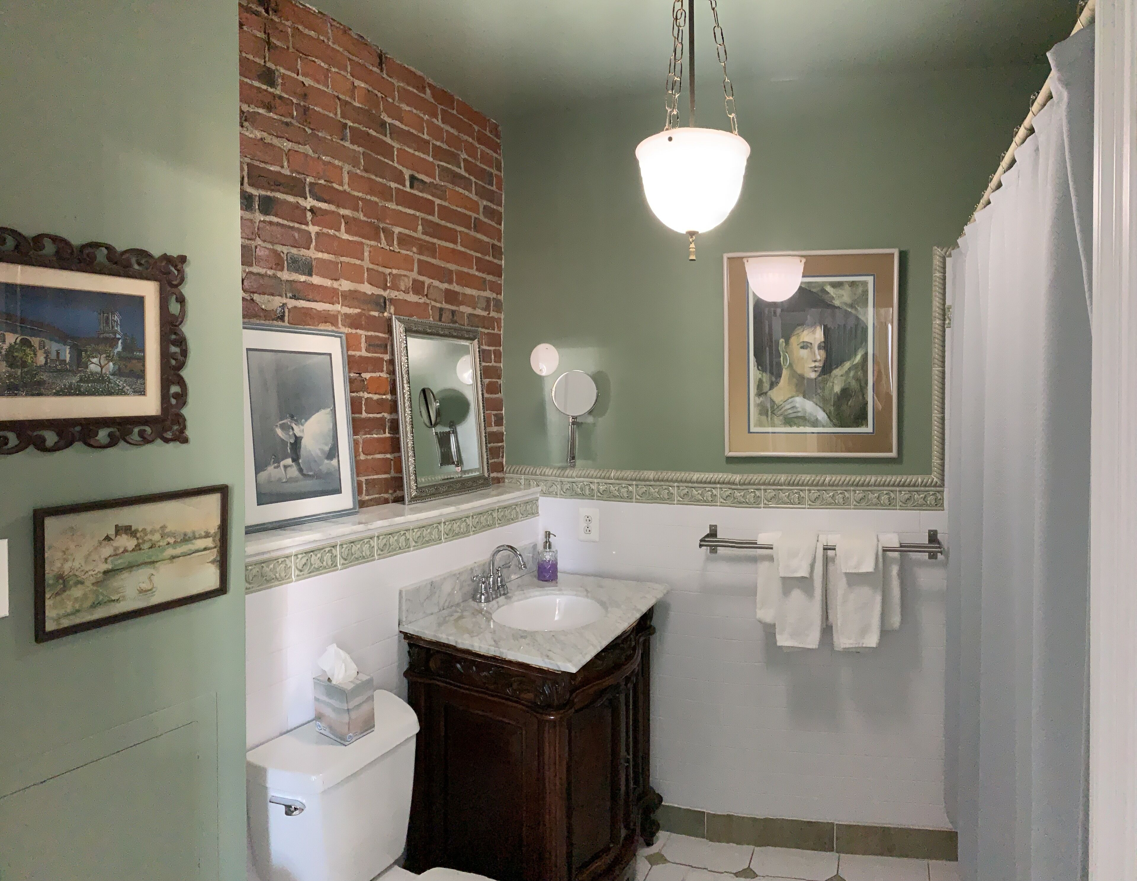 signature suite, 1 king bed | bathroom | combined shower/bathtub, free toiletries, hair dryer, dressing gowns