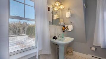 Suite, 1 King Bed, Balcony | Bathroom | Shower, free toiletries, hair dryer, bathrobes