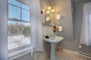 Suite, 1 King Bed, Balcony | Bathroom | Shower, free toiletries, hair dryer, bathrobes