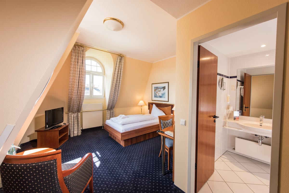 Standaard eenpersoonskamer | Een kluis op de kamer, gratis babybedden, gratis wifi