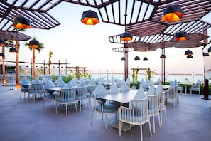 Breakfast, lunch, dinner served; international cuisine, pool views