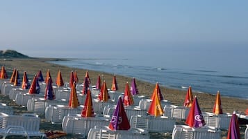 On the beach, scuba diving
