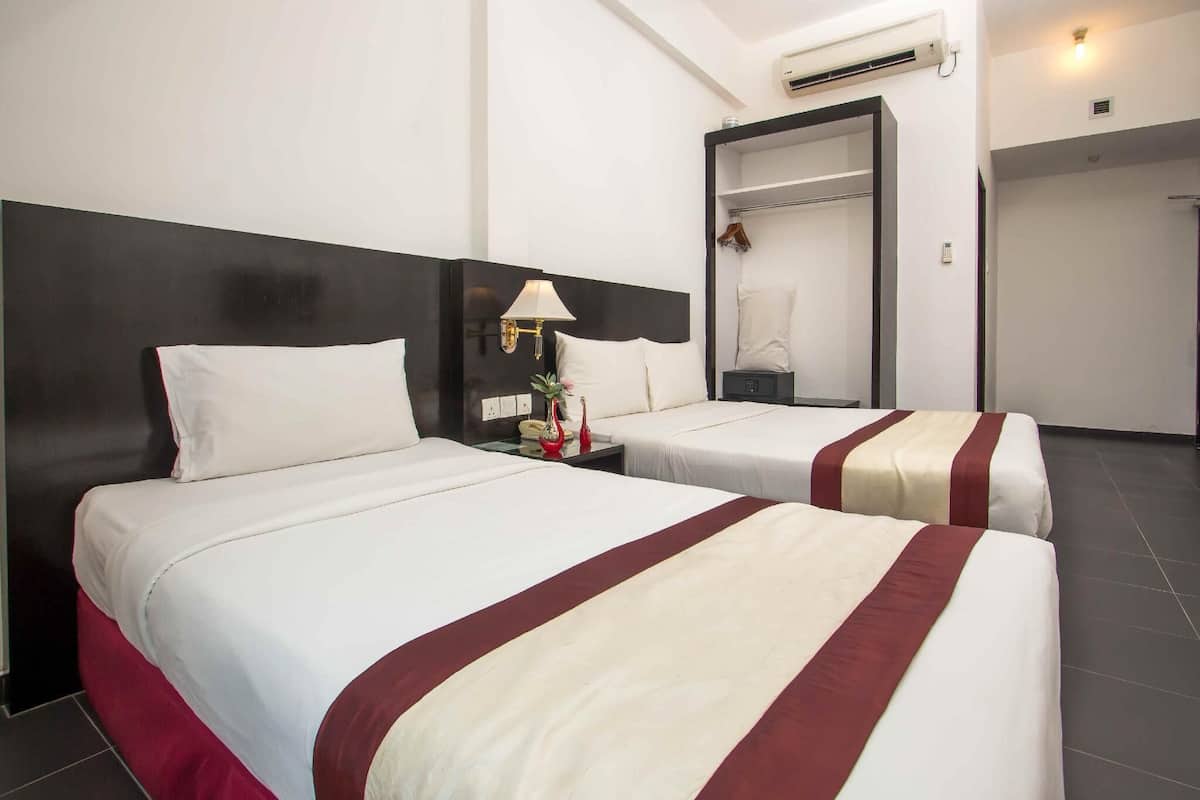 Deluxe Triple Room, City View | Blackout drapes, free WiFi, bed sheets