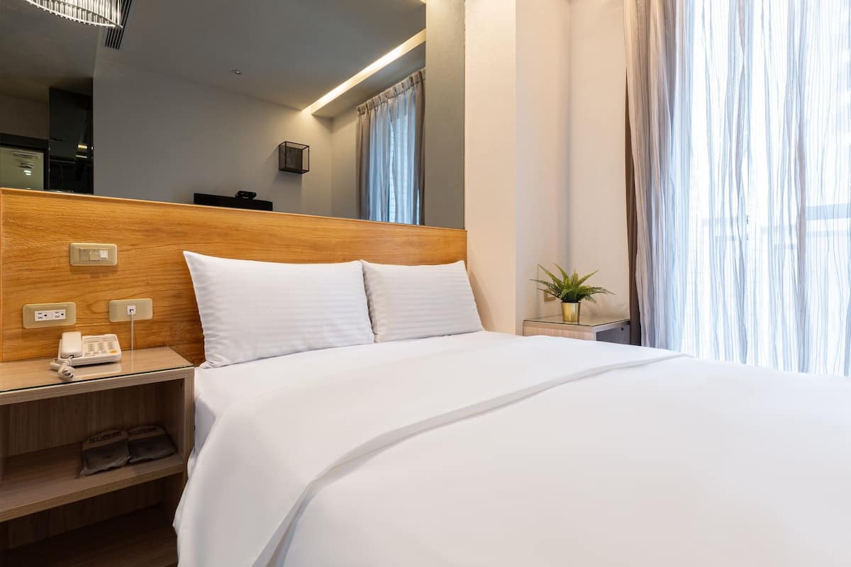Habitación doble Deluxe | Insonorización, wifi gratis y ropa de cama