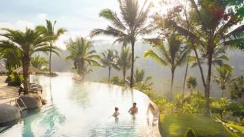 3 outdoor pools, open 7:00 AM to 9:00 PM, pool umbrellas, pool loungers