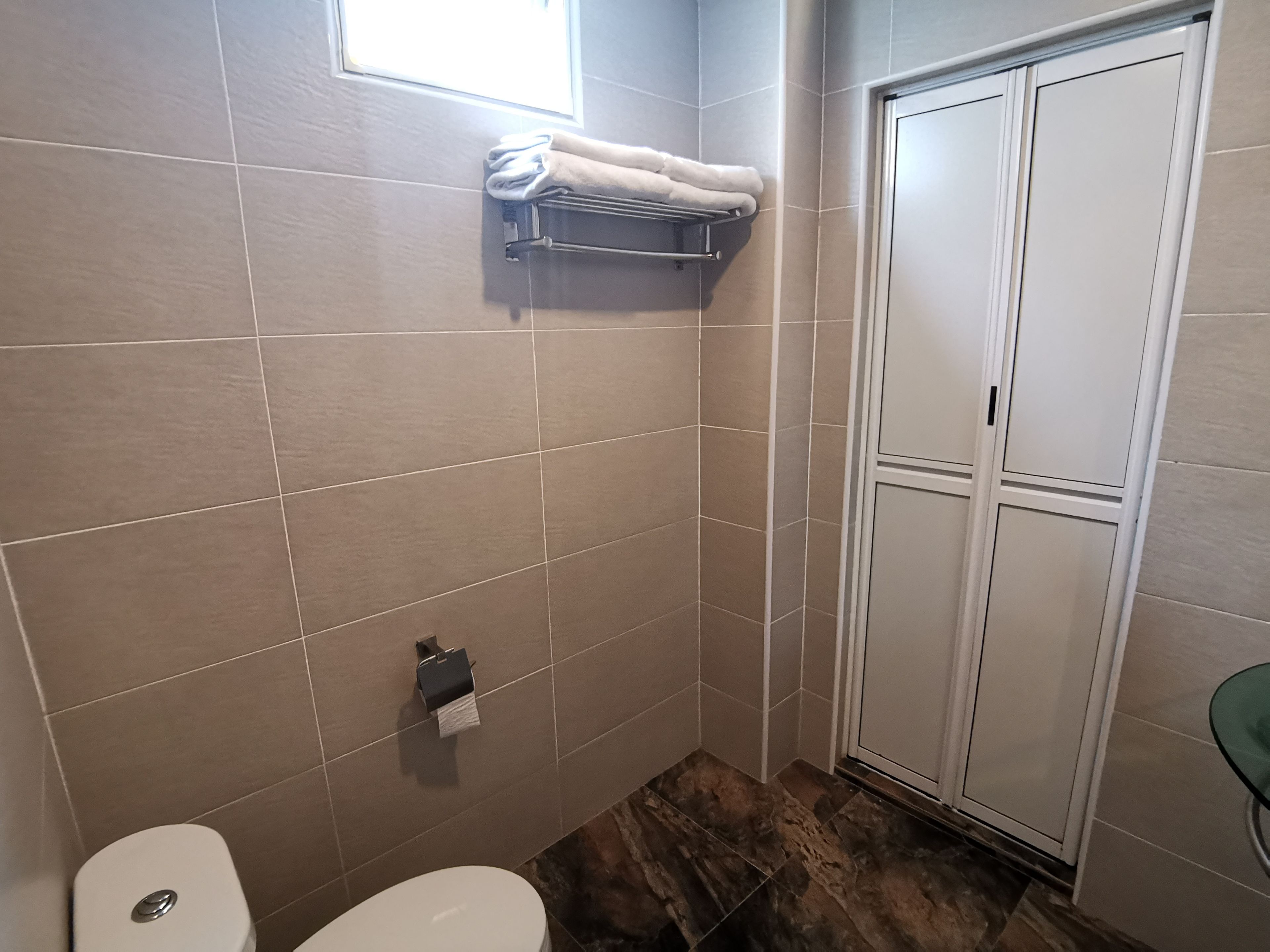 family room | bathroom | shower, free toiletries, hair dryer, towels