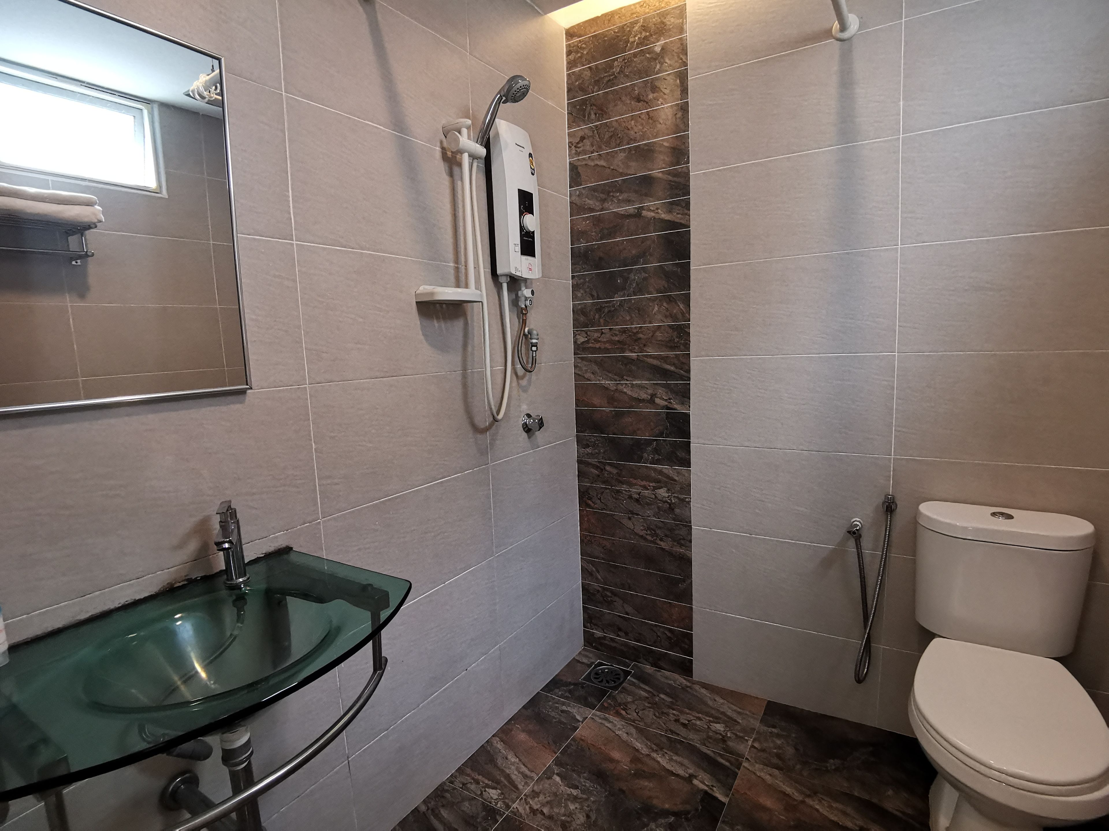 family room | bathroom | shower, free toiletries, hair dryer, towels