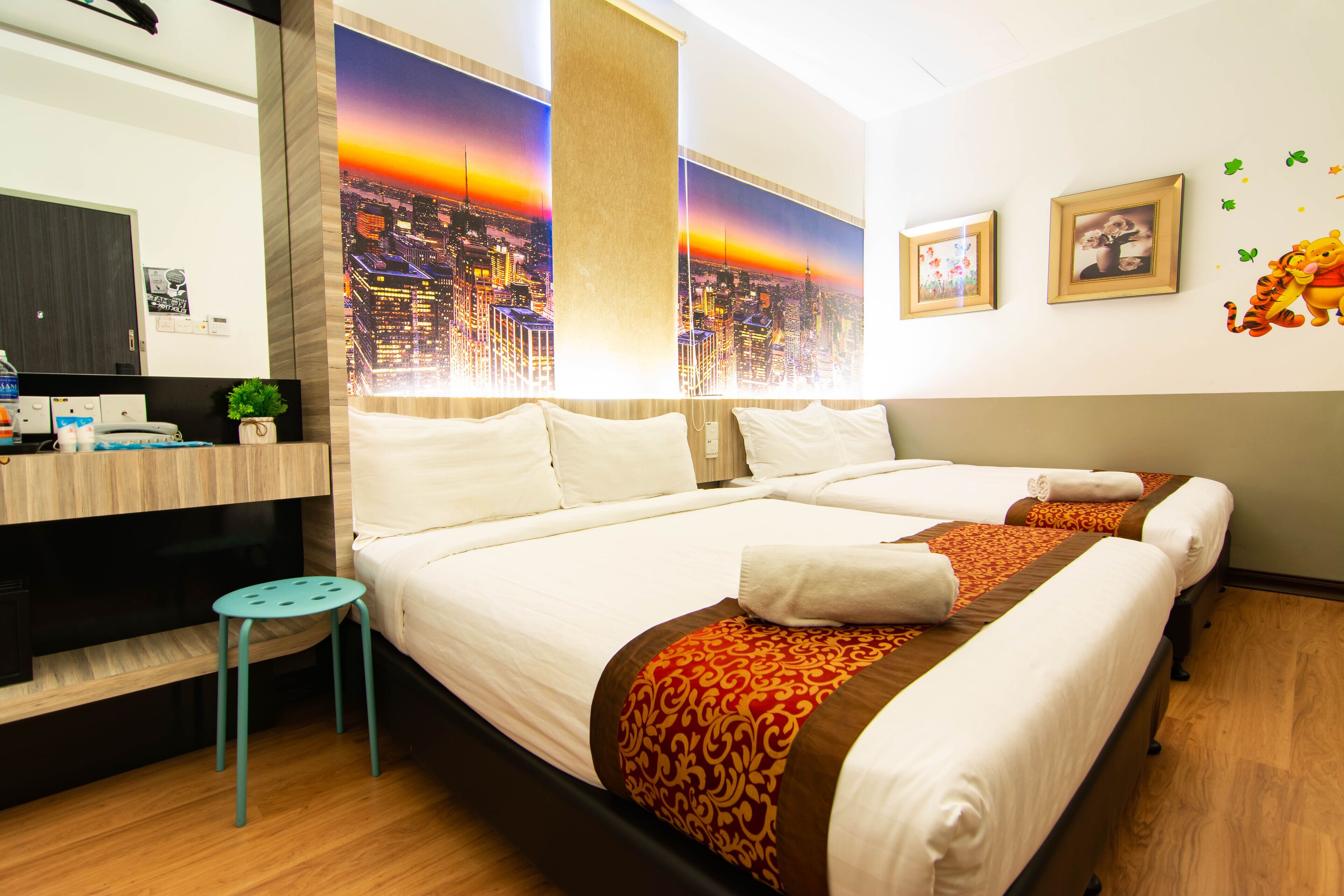 family room | in-room safe, desk, blackout curtains, iron/ironing board