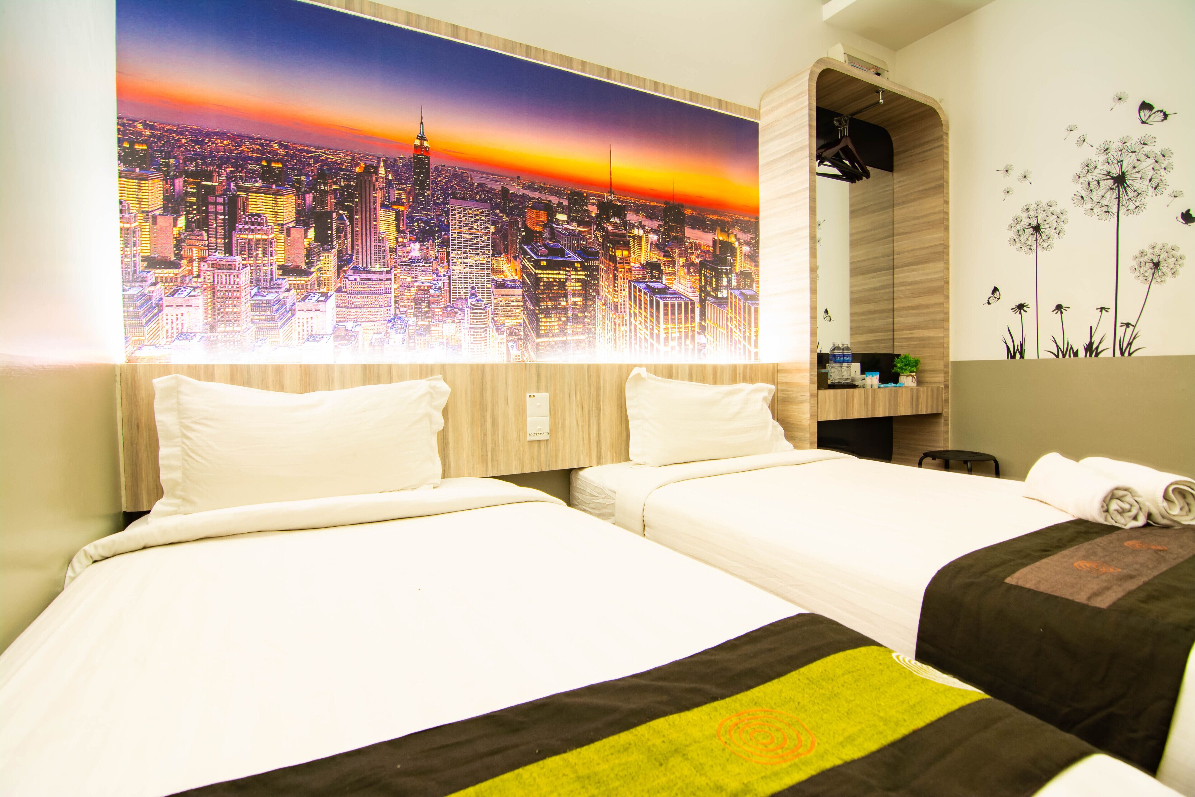 standard twin room | in-room safe, desk, blackout curtains, iron/ironing board