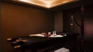 A cozy dining area with a table, bench, and scale, perfect for a quiet meal.
