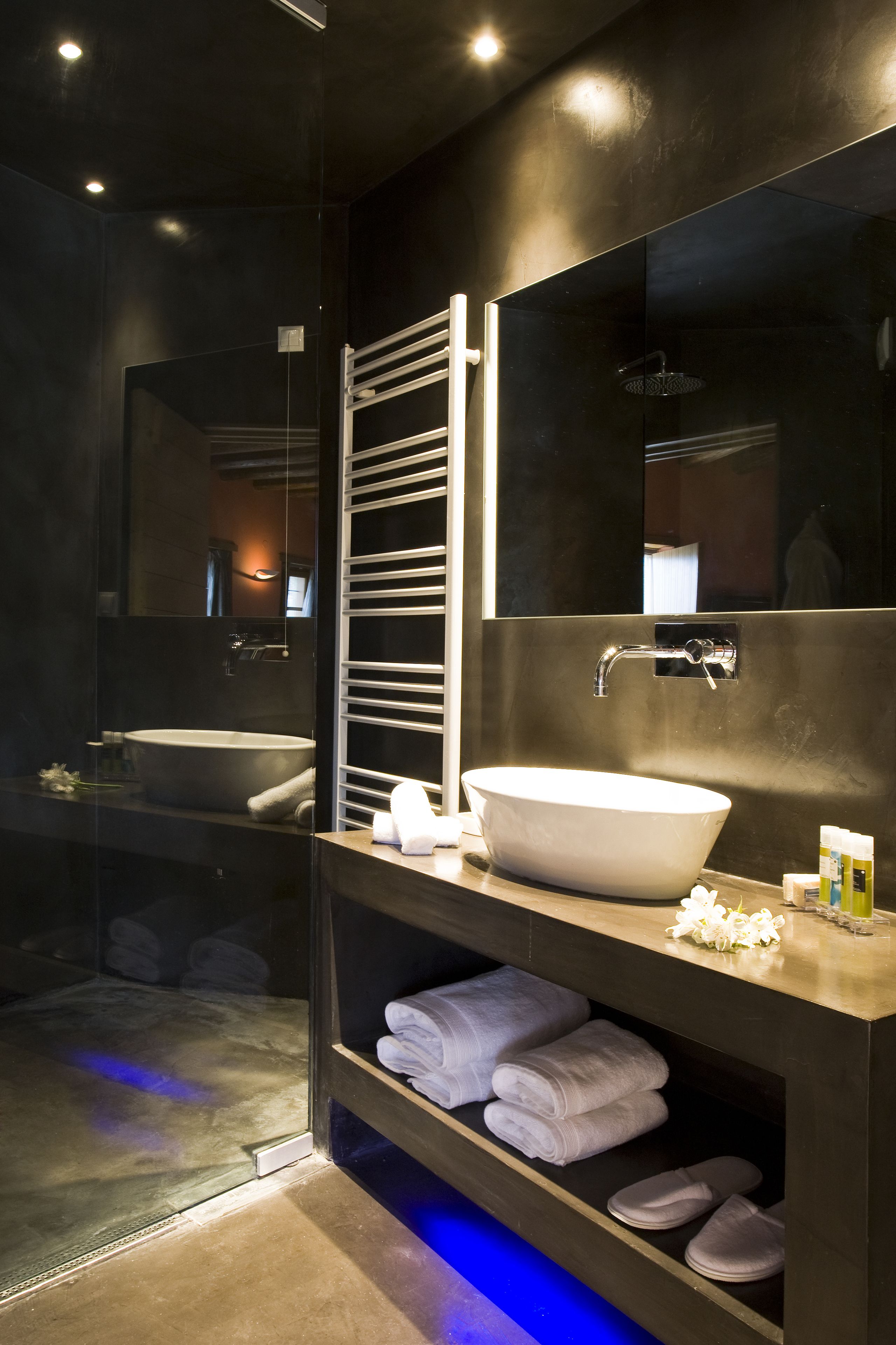 designer toiletries, hair dryer, bathrobes, slippers