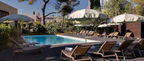 Outdoor pool, open 10:00 AM to 9:00 PM, pool umbrellas, pool loungers