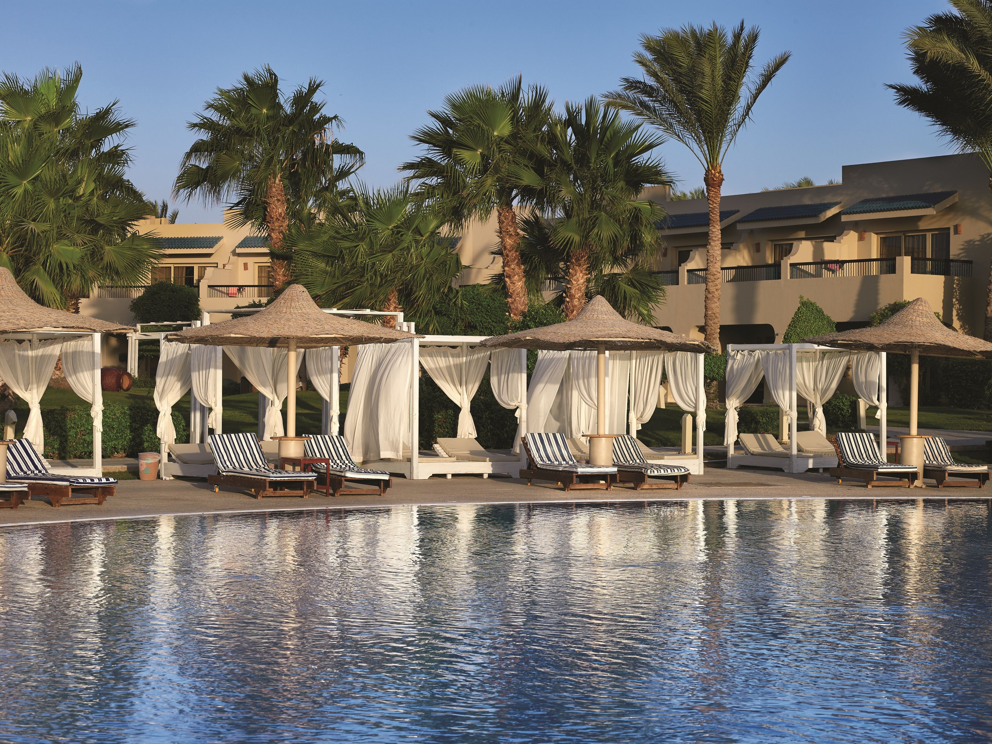 2 outdoor pools, pool umbrellas, pool loungers