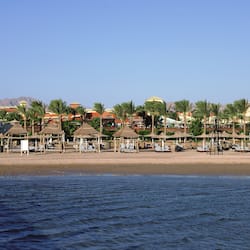 Private beach, white sand, sun loungers, beach umbrellas