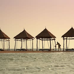 Private beach, white sand, sun loungers, beach umbrellas