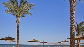 Private beach, sun loungers, beach umbrellas, beach towels