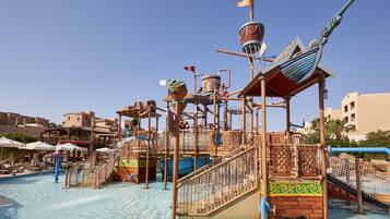 A water park with a pirate-themed play structure, including slides and climbing areas.