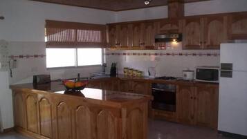 Apartment, 2 Bedrooms (Villea) | Private kitchen | Fridge, microwave, stovetop, coffee/tea maker