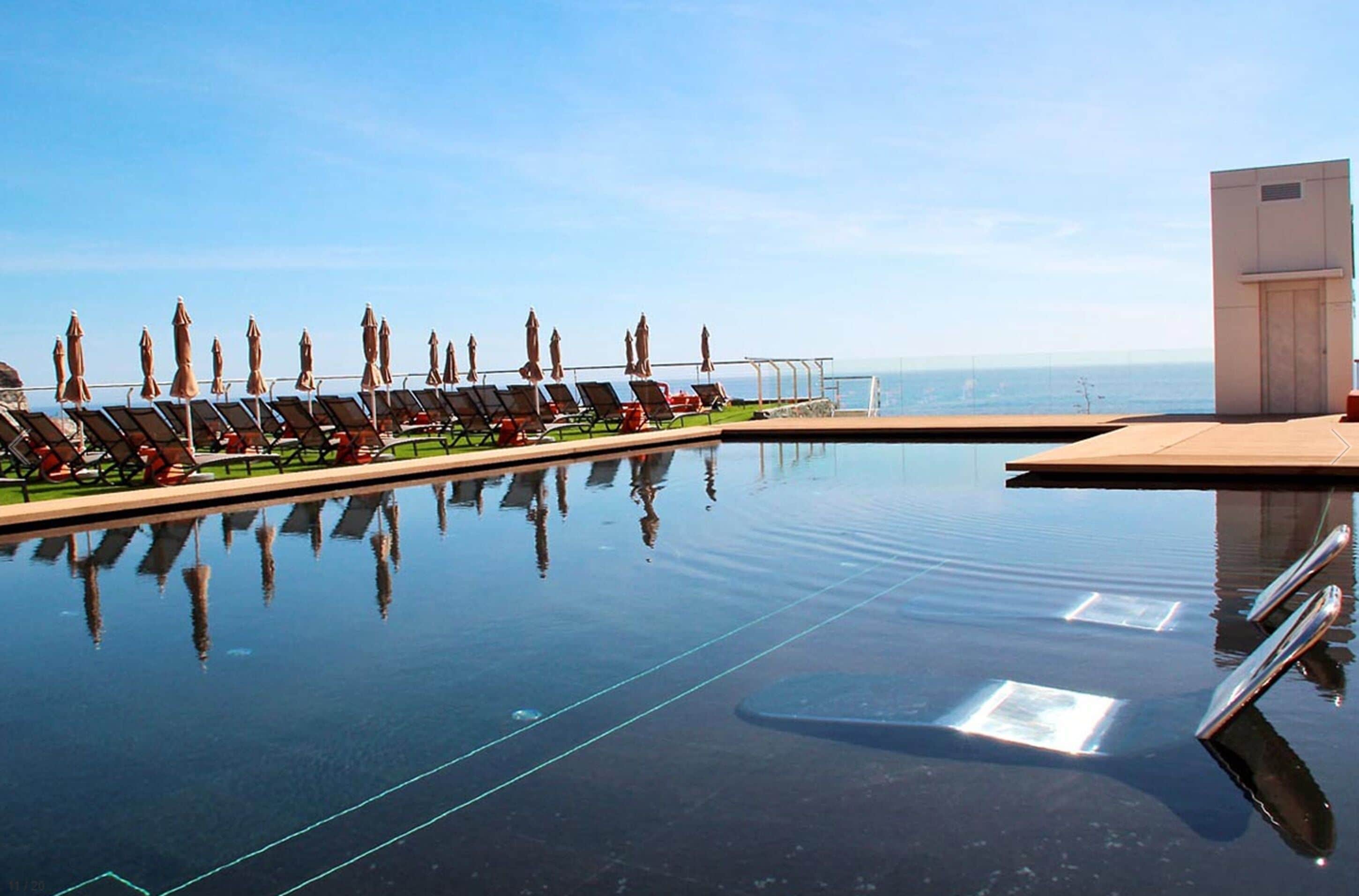 outdoor pool, pool umbrellas, pool loungers