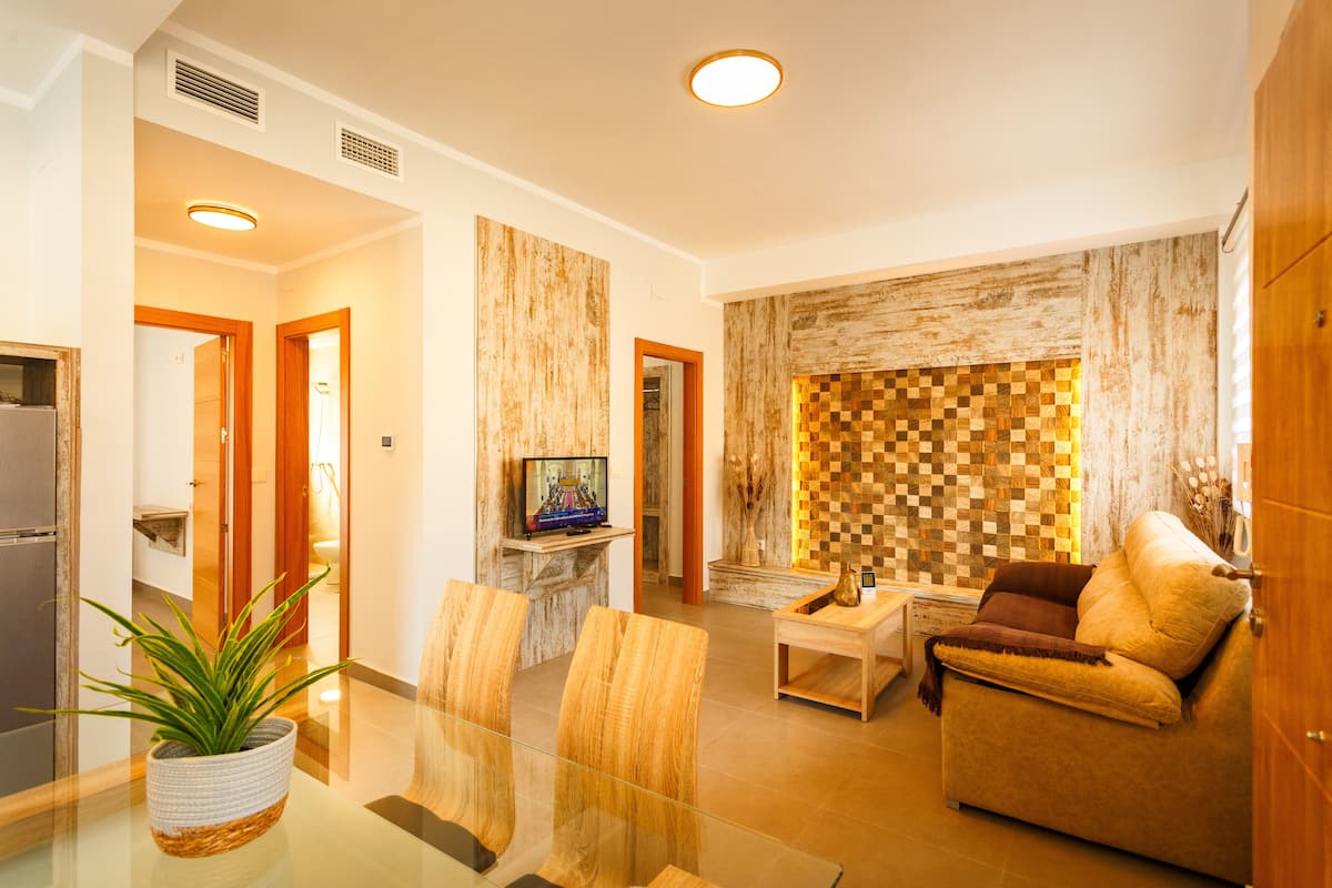 Nevada Apartment | Área de sala de estar | Televisión de pantalla plana