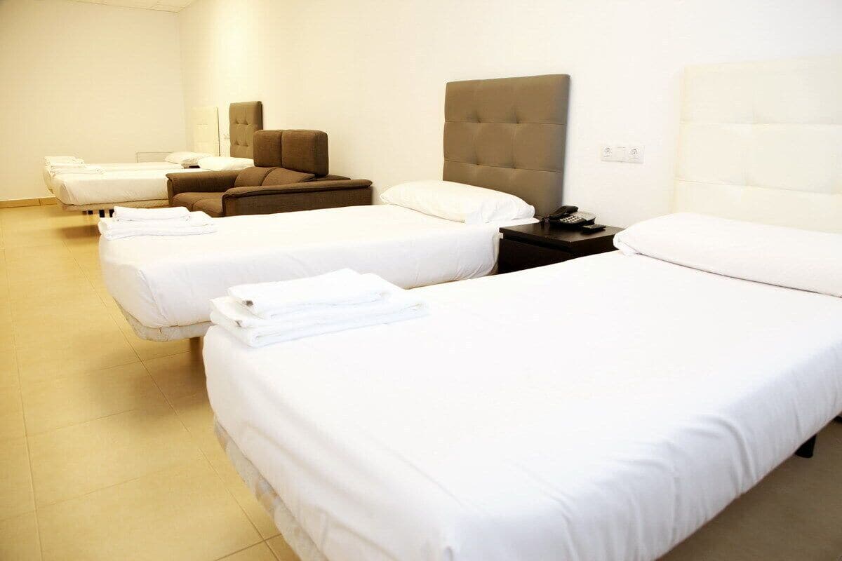 quadruple room | premium bedding, down duvets, individually decorated