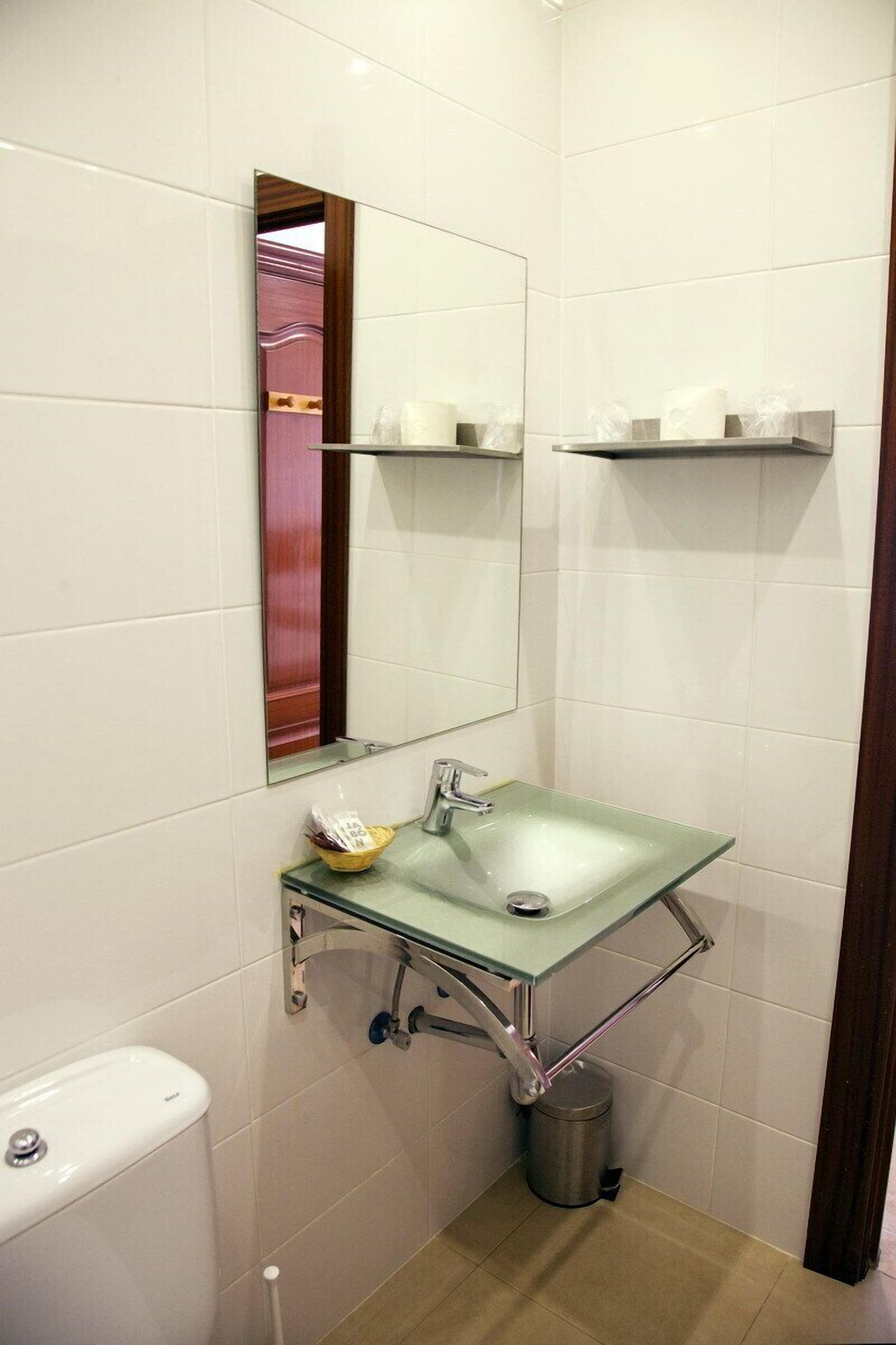 twin room | bathroom | shower, rainfall showerhead, designer toiletries, towels