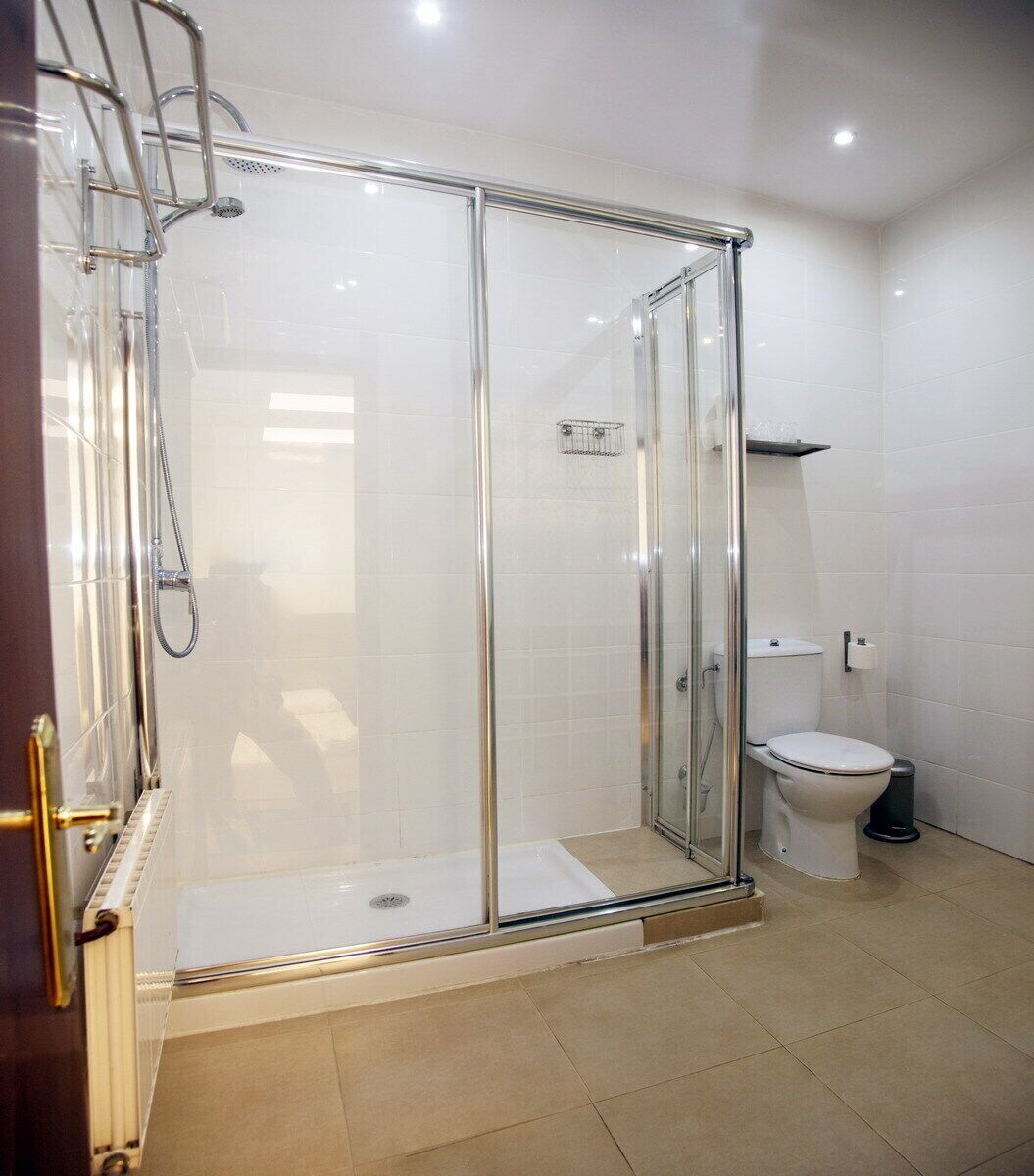 quadruple room | bathroom | shower, rainfall showerhead, designer toiletries, towels