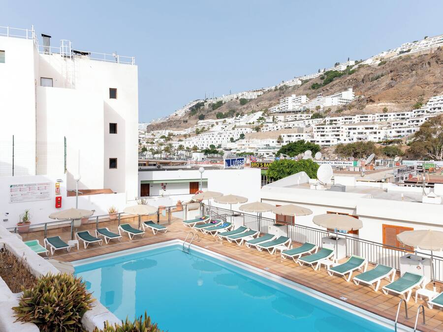 Outdoor pool, pool umbrellas, pool loungers