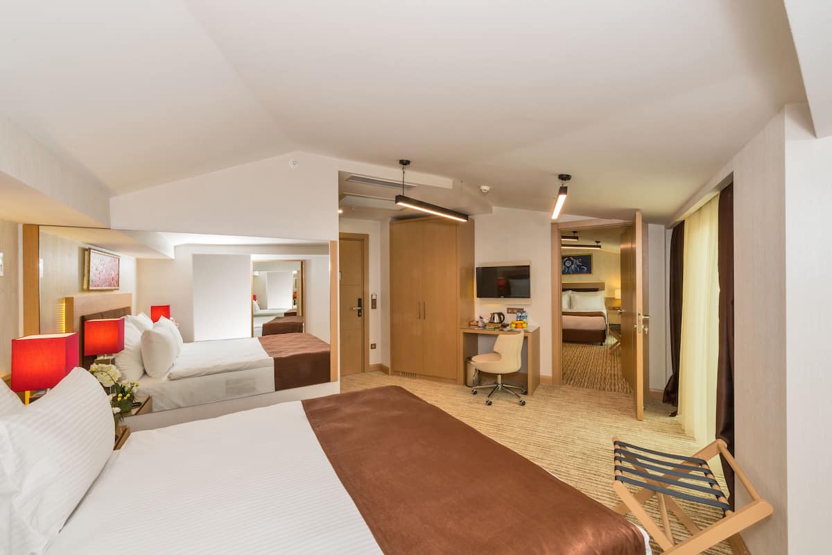 Family Room, 2 Bedrooms, 2 Bathrooms, City View | Minibar, in-room safe, desk, laptop workspace