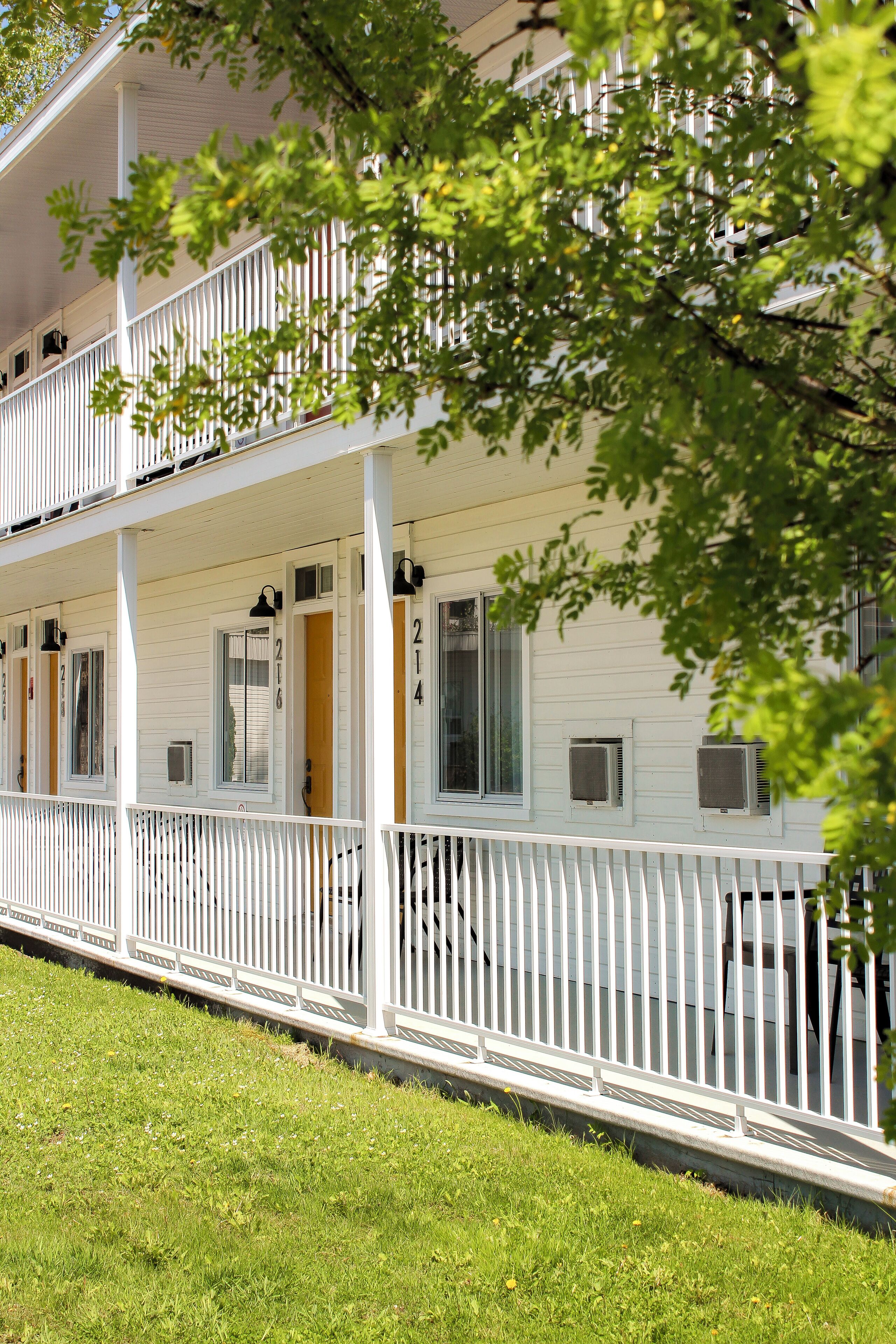 Room 1 Queen Bed Saguenay View | Select Comfort beds, desk, soundproofing, free WiFi