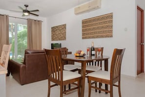Family Apartment, 2 Bedrooms, Pool View (111-Deposit will be required) | In-room dining