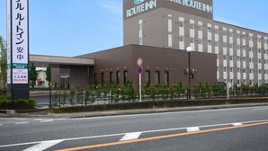 A Hotel Route Inn building with a modern design, featuring a prominent signboard and a well-maintained facade. - Hotel Route-Inn Annaka (Annaka)