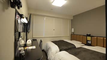 Down comforters, desk, free WiFi, bed sheets