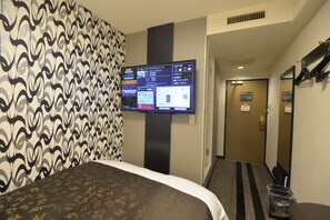 Down comforters, desk, free WiFi, bed sheets
