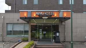 The entrance to APA Hotel with a modern design, featuring a glass facade and a welcoming entrance. - APA Hotel Nishimaizuru-Ekimae (Maizuru)