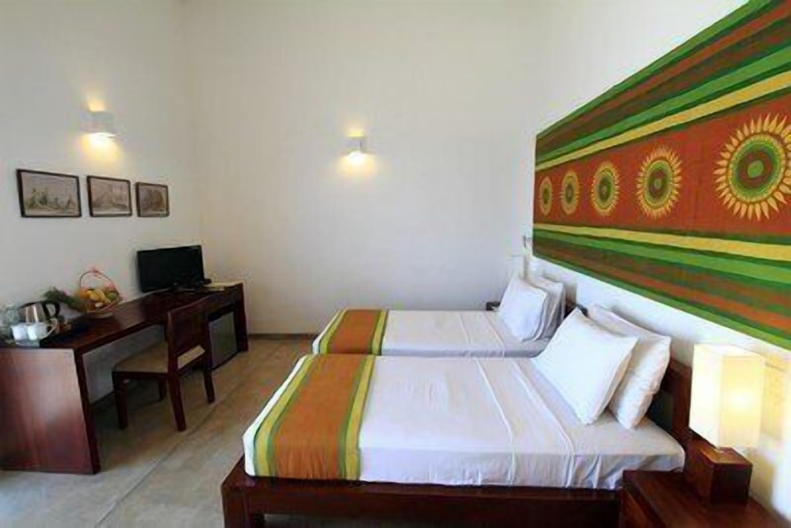 deluxe double or twin room, 1 double or 2 single beds | in-room safe, desk, iron/ironing board, rollaway beds