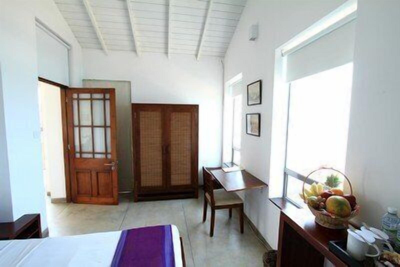 deluxe double or twin room, 1 double or 2 single beds | in-room safe, desk, iron/ironing board, rollaway beds