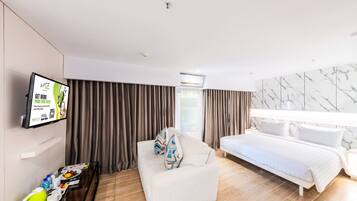 Family Room | Premium bedding, in-room safe, desk, free WiFi