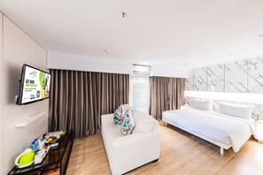 Family Room | Premium bedding, in-room safe, desk, free WiFi