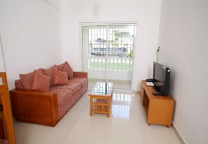Suite | Living area | LCD TV, DVD player - Phils Residency & Banquets (Kochi)