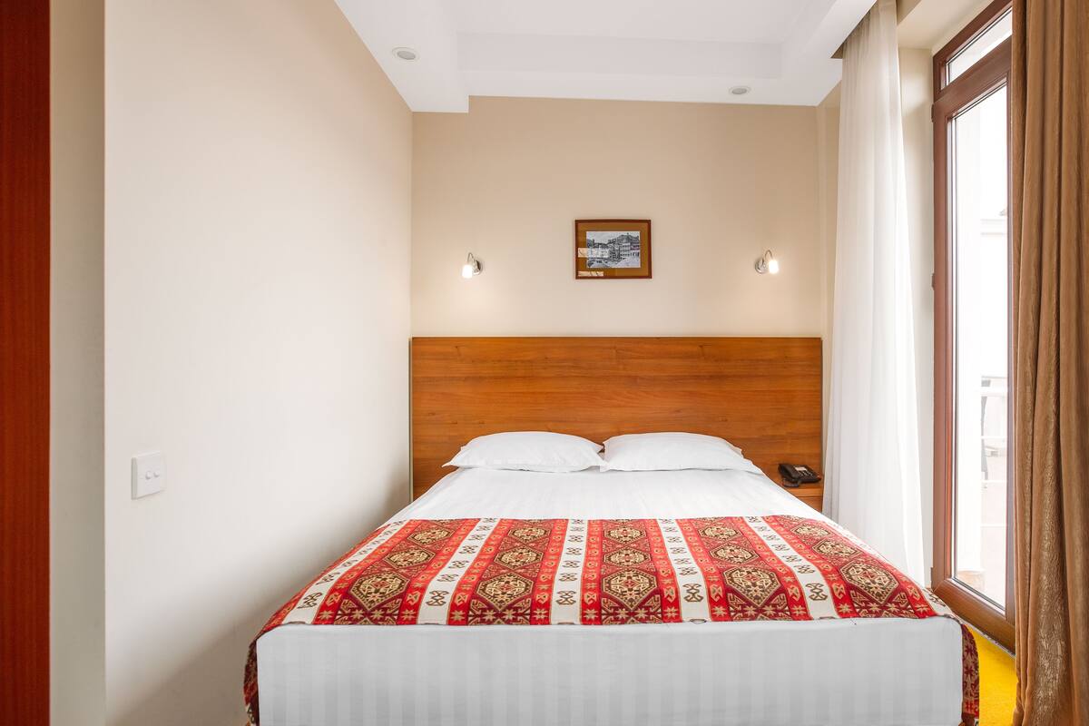 Premium bedding, minibar, desk, laptop workspace